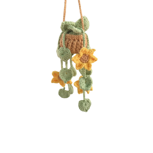 Crocheted hanging decoration with flowers on a white background