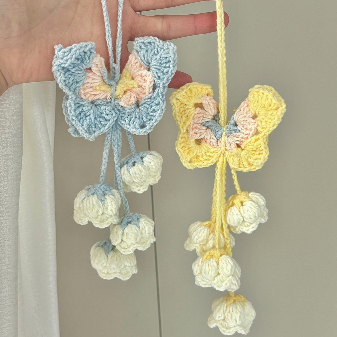Handmade woven butterfly lily of the valley flower pendant, DIY material kit for making bag charms, keychains, and gifts.