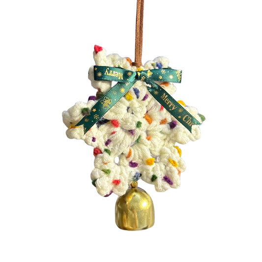 Decorative Christmas ornament with a gold bell and colorful pom-poms on a white background