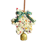 Decorative Christmas ornament with a gold bell and colorful pom-poms on a white background