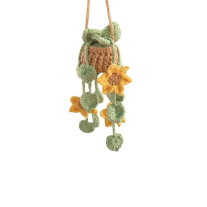 Crocheted hanging decoration with flowers on a white background