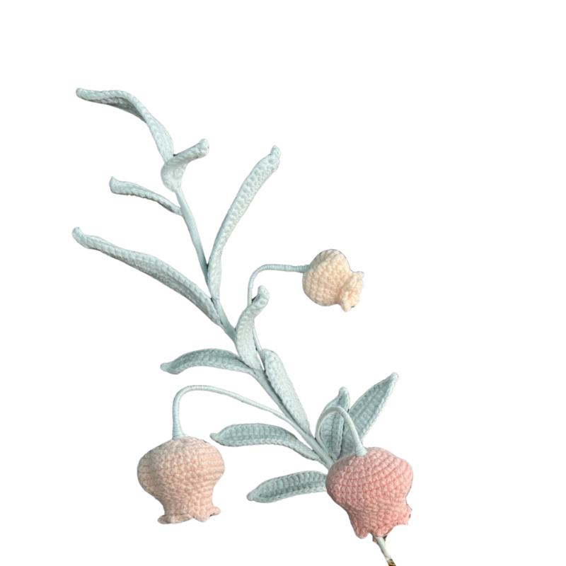 Decorative coral branch with pink coral-like flowers on a white background