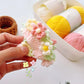 Daisy bouquet coaster DIY crochet kit with lily of the valley hand-knitted roses
