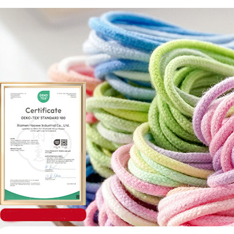 Colorful yarn skeins with an Oeko-Tex certification label.