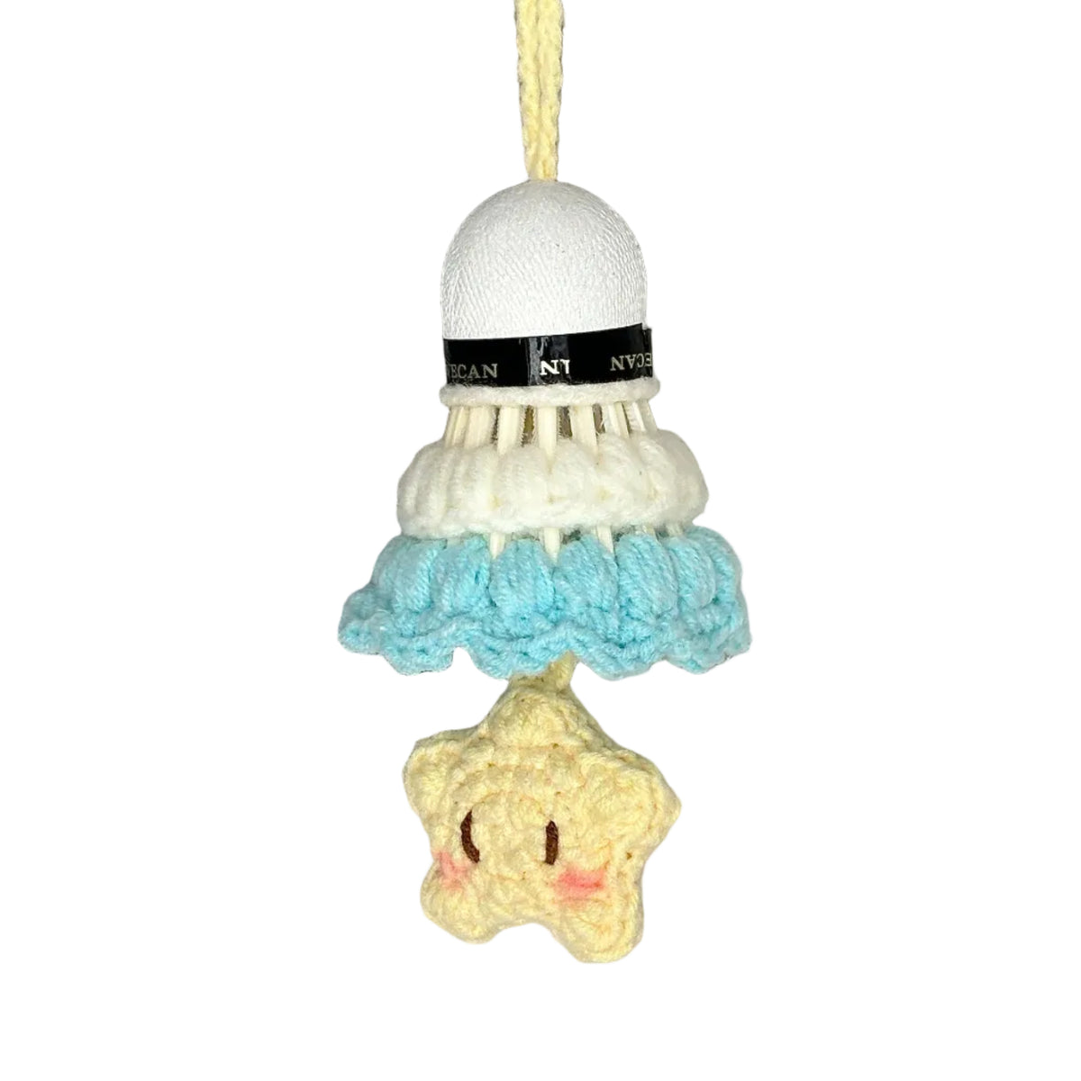 Crocheted badminton shuttlecock with a star-shaped charm on a gray background