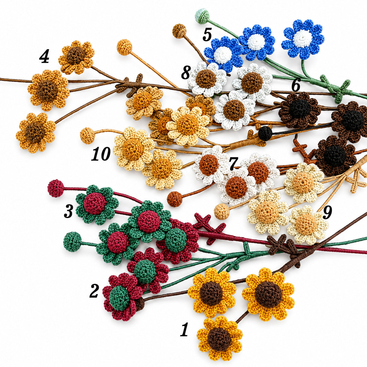 A set of crocheted floral stems arranged on a white background, numbered 1 through 10. The flowers include yellow sunflowers, white daisies with brown centers, blue flowers, mustard blooms, red and green daisies, and dark brown flowers, each attached to brown or green stems.