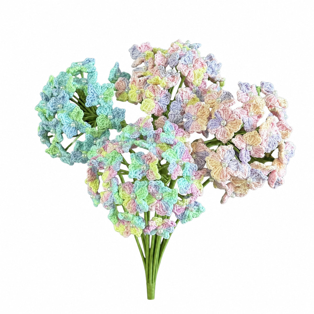 A bouquet of artificial pastel hydrangea-style flower heads on green stems, photographed against a plain white background.