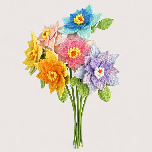 A bouquet of handmade crocheted flowers in multiple colors including blue, pink, purple, yellow, and orange, with green stems and leaves, set against a solid light beige background.