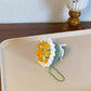 various colorful crocheted ice cream cones