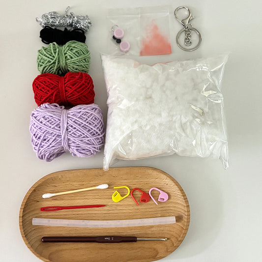 Eggplant doll crochet DIY kit, a gift for friends, a crocheted pendant bag.