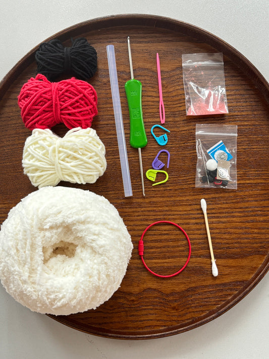 DIY teddy bear headphone bag knitting kit with yarn and crochet hooks