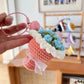 various colorful crocheted ice cream cones